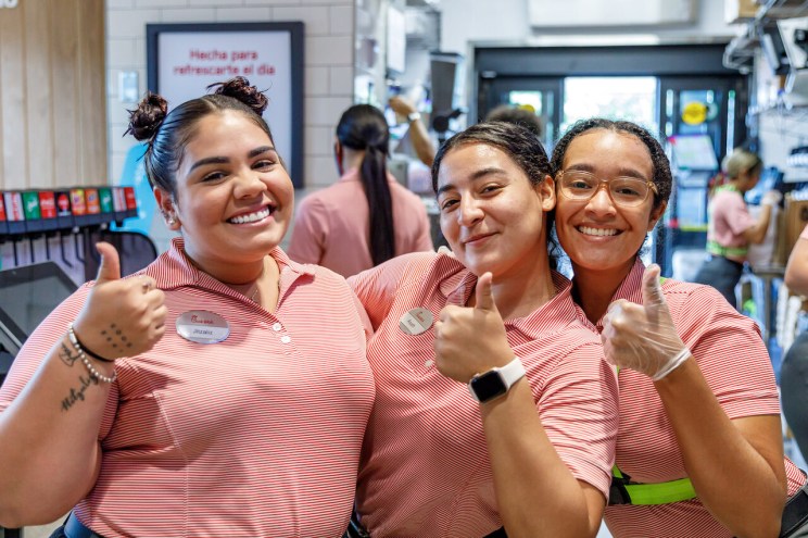 Three female Team Members smiling in the restaurant