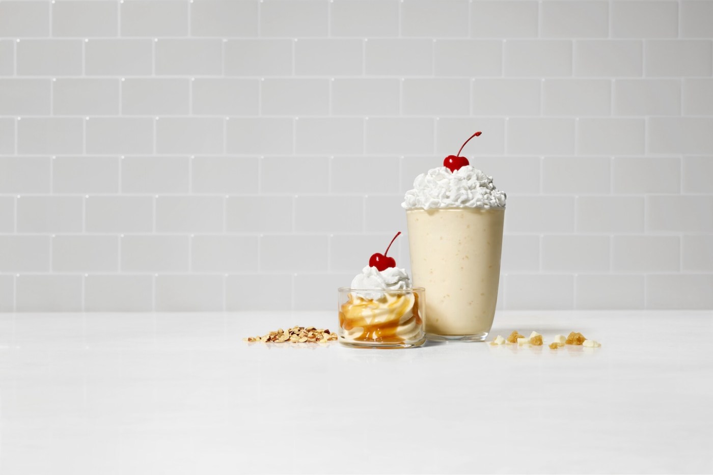 Two Salted Caramel Chick-fil-A desserts sitting on a table.