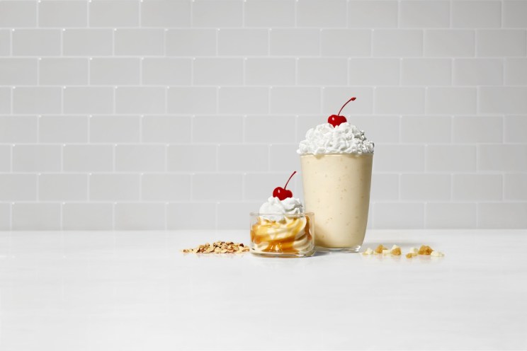 Two Salted Caramel Chick-fil-A desserts sitting on a table.